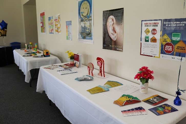 Educational brochures and hand outs about communication disorders are presented on tables at the open house for the Thiel Center for Speech Language Services.