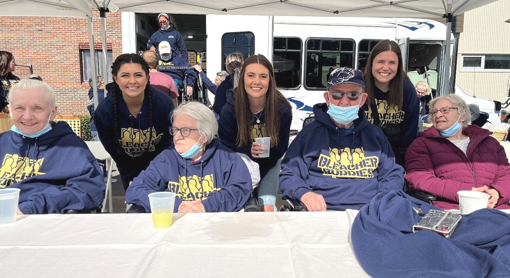 NSSLHA members host their Bleacher Buddies to a sideline lunch at the game.