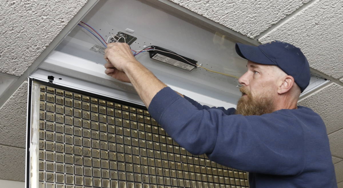 facilities changing ballast in lighting