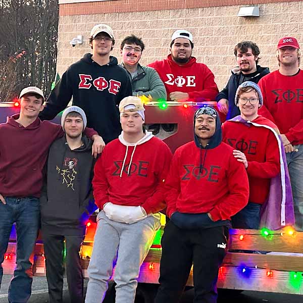 Fraternity students community parade participants   2025