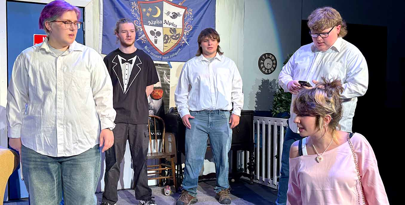 Theater production actors on stage story 2026